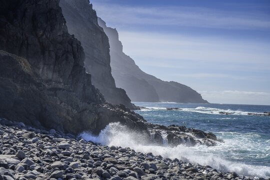 The beach framed by rocks at Playa del Trigo, Alojera, La Gomera, Spain