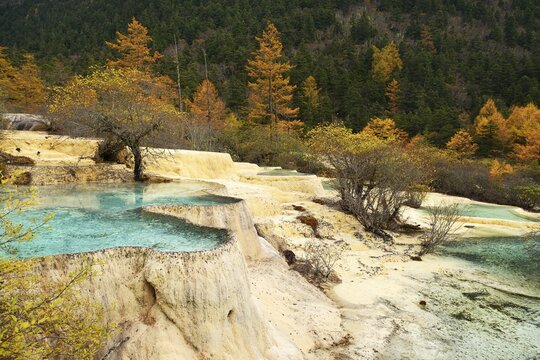 Lime terraces with lake in autumnal environment, Huanglong National Park, Sichuan Province, China