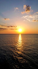Fototapeta premium Sunset over tranquil ocean