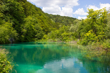 summer landscape with lakes and waterfalls in Plitvice National Park, Croatia