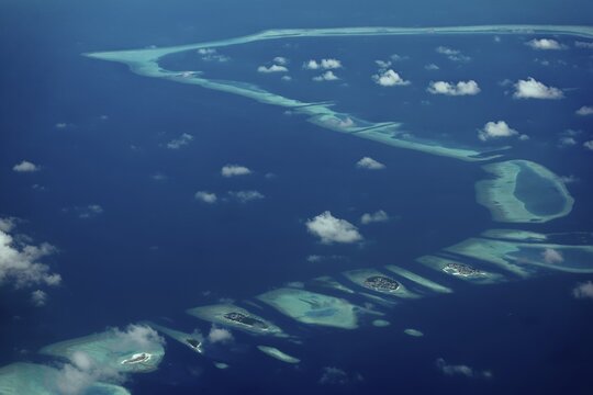 Chain of inhabited islands, from right Keyodhoo, Felidhoo, Thinadhoo, Arah Beach Resort, Vaavu Atoll or Felidhu Atoll, Indian Ocean, Maldives