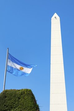 Obelisk and Argentinian flag on Avenue 9 de Julio, Buenos Aires, Argentina