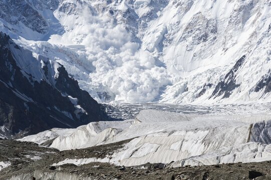 Avalanche coming down near Base Camp, Pabeda-Khan Tengry glacier massif, Central Tien Shan Mountain Range, Border of Kyrgyzstan and China, Kyrgyzstan
