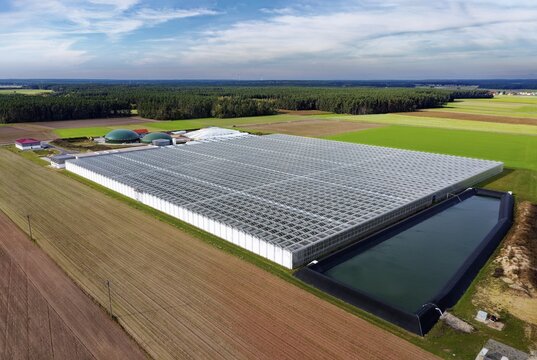 Modern greenhouse with biogas plant, composting and rainwater collection basin, near Abenberg, Middle Franconia, Franconia, Bavaria, Germany