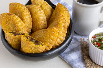 Handmade Colombian empanadas – Image of traditional Valluna empanadas with homemade filling, perfect to illustrate Latin gastronomy