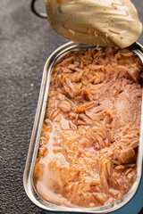 Tuna canned fish seafood tasty snack fresh delicious gourmet food background on the table rustic food top view copy space pescetarian diet