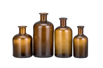 Elegant glass bottles displayed on studio shot