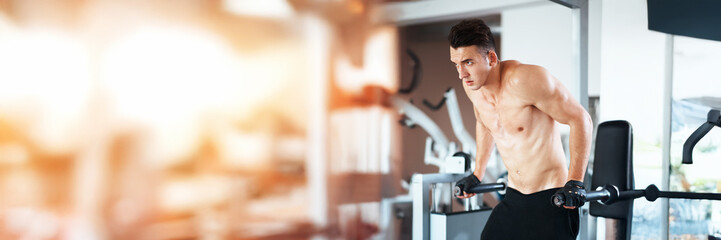 Fit Man Exercising in Gym Wide Banner with Copy Space