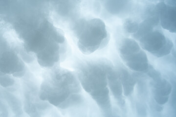 Abstract cloudscape with fluffy overcast formations