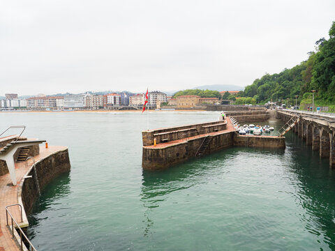 Scenic coastal view of Zarautz with Basque flag