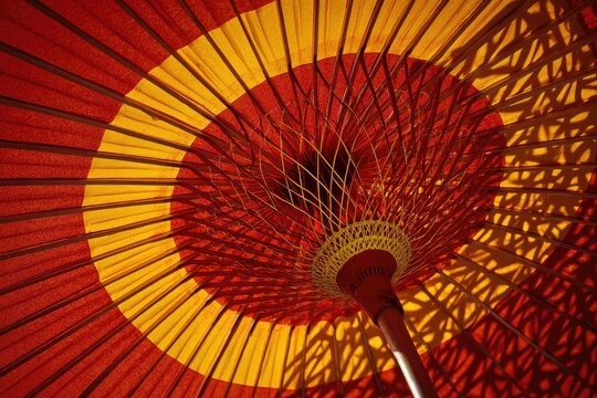 Red and yellow umbrella, intricate ribs
