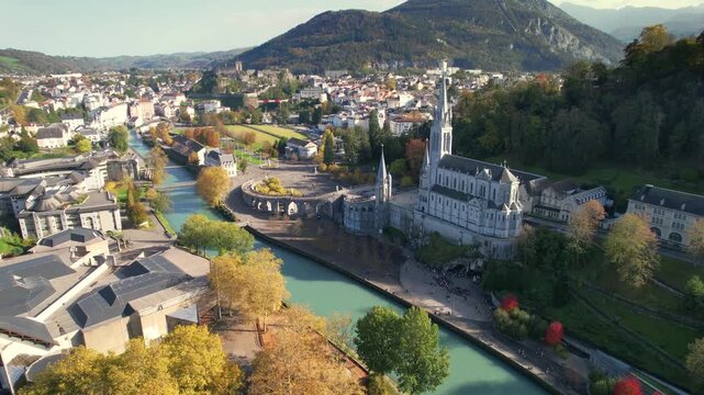 Lourdes Sanctuary aerial view with river and vibrant autumn landscape