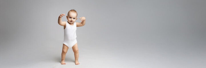Adorable Baby in White Onesie Wide Banner with Copy Space
