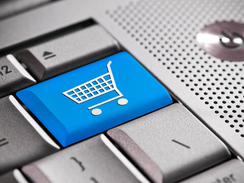 Online shopping cart icon on computer keyboard button