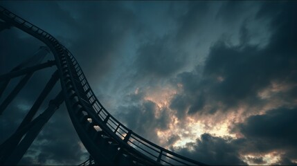Roller coaster track dramatic sky silhouette