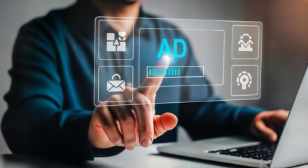 Person interacting with a futuristic digital interface displaying advertising and marketing concepts, symbolizing online business growth and strategy