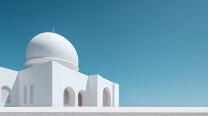 White mosque structure against blue sky