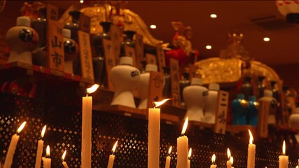 京都の祇園祭　御旅所に鎮座する神輿　風に揺れるロウソクの炎 - Powered by Adobe