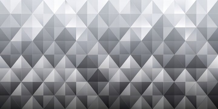 Abstract grayscale geometric pattern of repeating triangular shapes creating a textured, modern design ideal for backgrounds and presentations