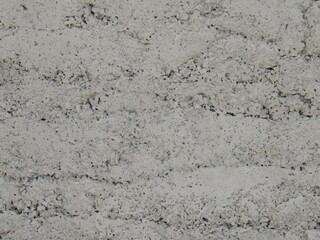 fragment of cracked concrete wall with grainy surface and empty copy space, graphic resource of background cement texture