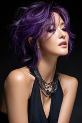A woman with purple hair is wearing a black dress and a necklace