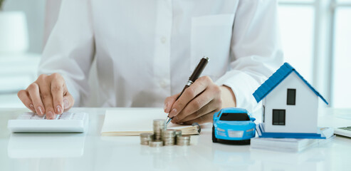 A financial concept image representing savings, real estate, insurance, mortgage, and investment,...