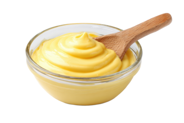 Creamy, golden-yellow sauce in a glass bowl, a wooden spoon dipped in it