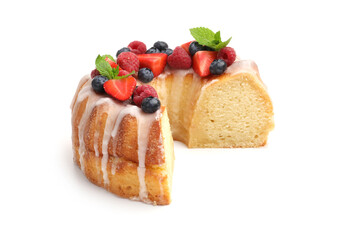 Piece of delicious bundt cake with berries, glaze and mint isolated on white