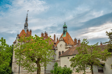 Fototapeta premium Historic palace of Counts Schonborn with terracotta roofs and towers.