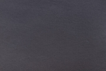 A simple and elegant dark gray textured paper background with a subtle diagonal pattern.