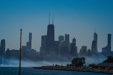  Aerial Drone View of Chicago Air Show with Planes Performing Stunts Over the City Skyline”