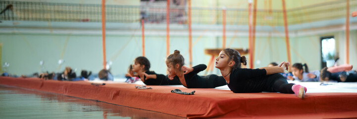 Kids Practicing Gymnastics Wide Banner