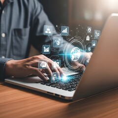 Man using laptop with glowing digital network of business and technology icons and data