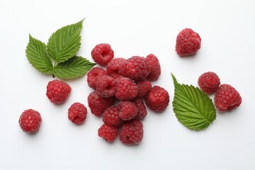 Tasty fresh ripe raspberries and leaves on white background, flat lay