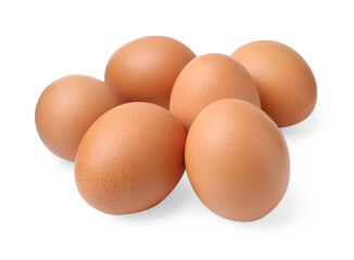 Many raw chicken eggs isolated on white