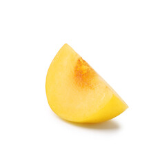 Piece of yellow cherry plum isolated on white