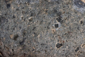 Granite stone background texture close up. Natural stone background.
