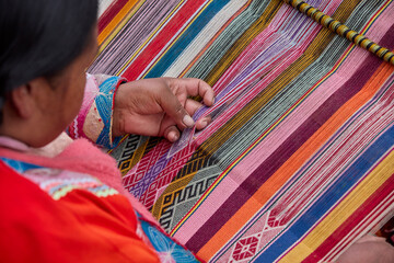 The hands of a weaver hold generations of skill, patience, and creativity, turning simple strands...