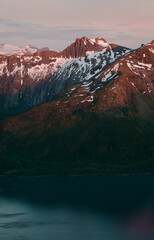 Sunset mountains and fjord landscape in northern Norway, Meloy - aerial view wild nature summer...