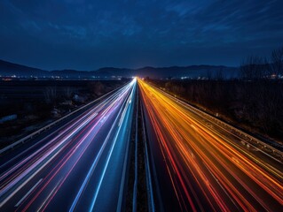 Time lapse of highway traffic at night, long exposure, motion blur, rural landscape, dark sky, aerial view, travel photography