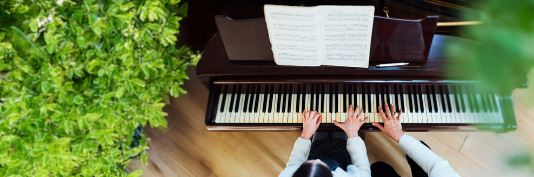 Hands Playing Piano Wide Banner with Copy Space - Powered by Adobe