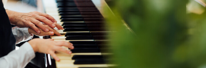 Piano Lesson with Hands on Keyboard Wide Banner