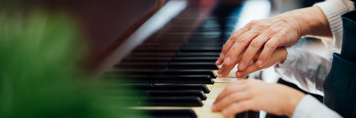 Hands Playing Piano Wide Banner with Copy Space © Аrtranq