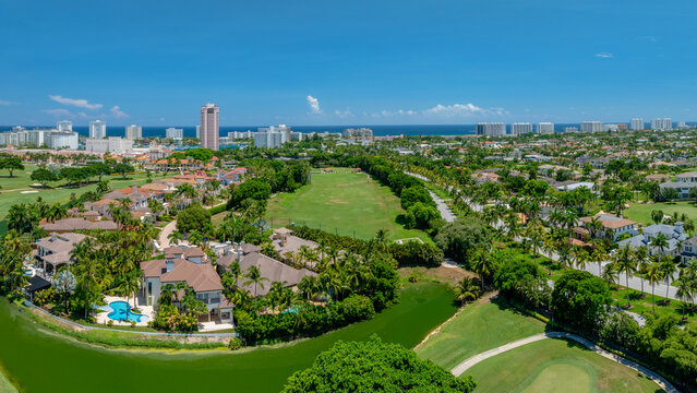 aerial drone view of Boca Raton, Florida with golf course and city