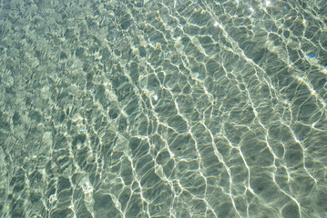Fototapeta premium Crystal clear water on the beach in Sardinia