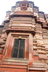 ancient Indian temple arches fragment,The sacred building carved from stone, Ancient rock curved temples of Hindu Gods at vrindavan