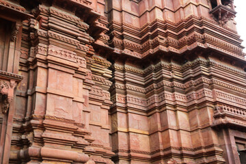 ancient Indian temple arches fragment,The sacred building carved from stone, Ancient rock curved temples of Hindu Gods at vrindavan