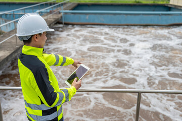 Environmental engineers work at wastewater treatment plants,Water supply engineering working at...