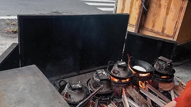 a recording of cooking traditional Indonesian pencakes that are suitable for street food