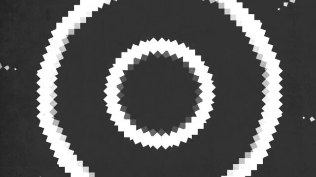An abstract black and white geometric pattern composed of overlapping triangles in varying sizes, creating a dynamic and visually striking design suitable for decorative purposes